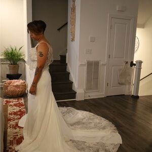 Beautiful wedding dress size 12. It’s a two piece with skirt and beaded top.